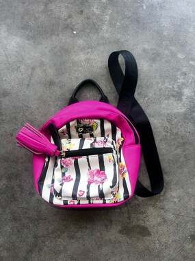 Betsy Johnson Pink and white striped mini backpack...